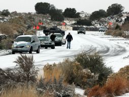 Las autoridades comenzarán con las labores para  eliminar el hielo en los puntos más conflictivos de las autopistas de la ciudad. AP /