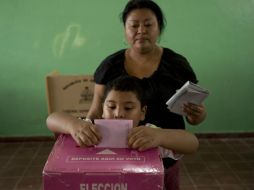 Este día los hondureños acudieron a las urnas para elegir un nuevo gobernante. AP /