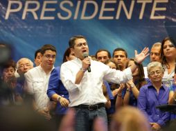 Juan Orlando Hernández, del gobernante Partido Nacional (conservador), se autoproclama ganador. AFP /