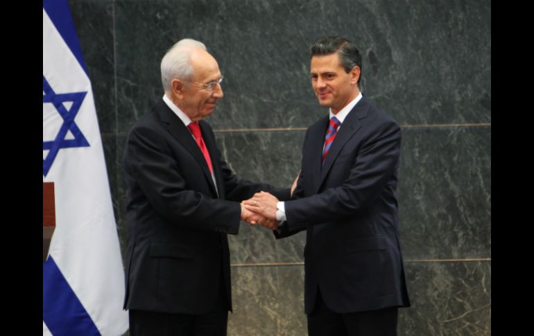 El presidente le dió la bienvenida con una ceremonia y ofrecerá una cena en honor del mandatario israelí. AP /