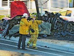 El Porsche quedó destrozado. Paul y su acompañante murieron. AP /