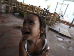 Una niña llora tras haber sido vacunada contra el sarampión durante una campaña de vacunación de OMS-UNICEF. EFE /