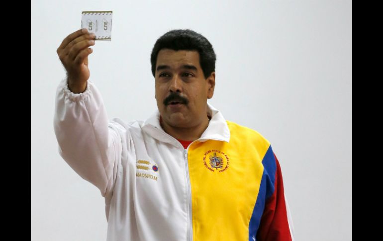 Nicolás Maduro asegura que la paz en el país durante el proceso electoral está garantizada. AP /