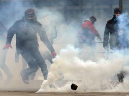 Registran enfrentamientos en Bolonia, Milán, Roma, Nápoles, Génova y Palermo. EFE /