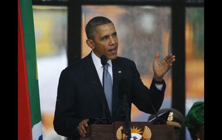 Barack Obama es uno de los mandatarios que dirigió un mensaje durante la ceremonia en honor a Mandela en el estadio Soccer City. AFP /