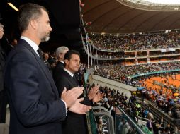 El Presidente Peña, junto con representantes de 91 naciones, asiste al homenaje a Nelson Mandela en el estadio FNB de Soweto. EFE /