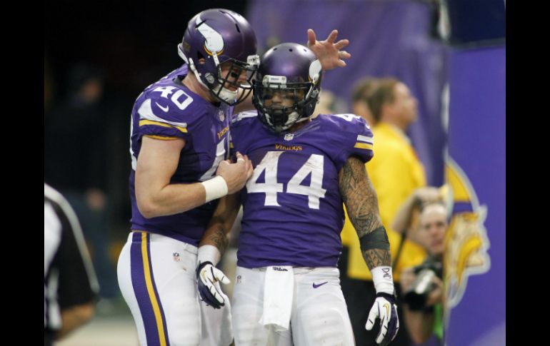 Matt Asiata (44) tuvo las primeras tres anotaciones de su carrera, sustituyendo a Adrian Peterson. AP /