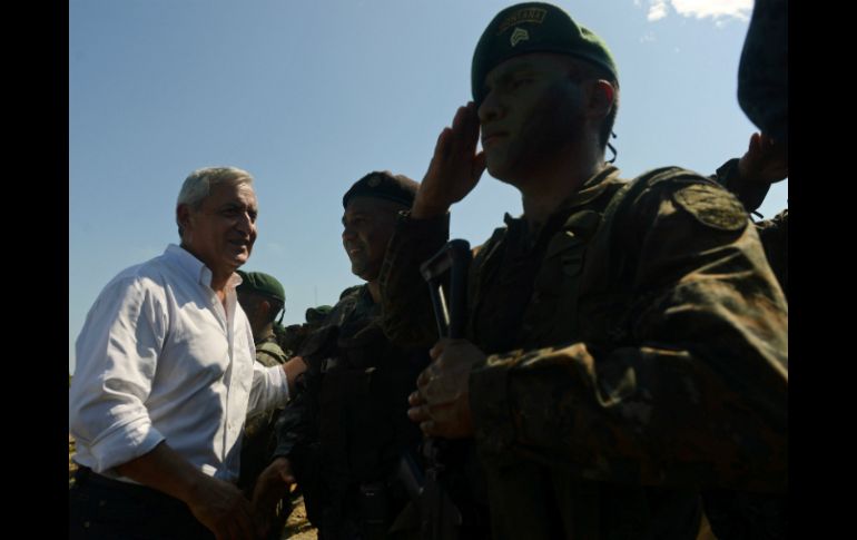 Pérez Molina inaugura el cuerpo militar que se deplegará en San Marcos, fronterizo con México. AFP /