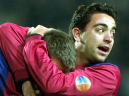 El Barsa, de Xavi, comparte la cima de la liga española con el Atlético de Madrid, que recibe el sábado al Levante. ARCHIVO /