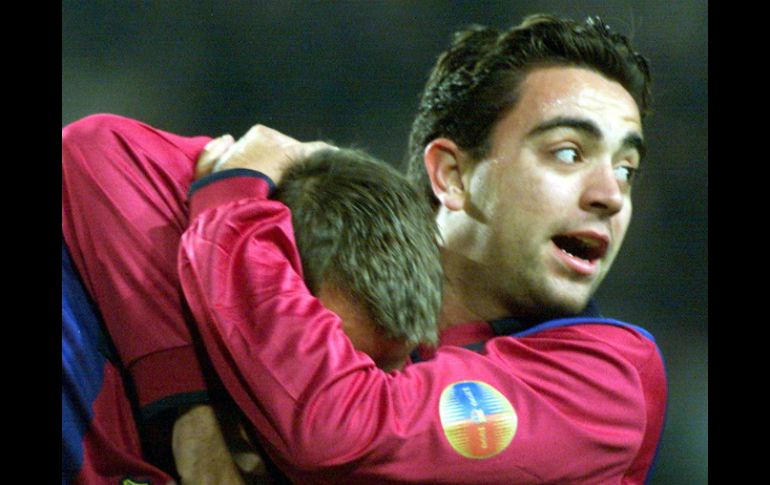 El Barsa, de Xavi, comparte la cima de la liga española con el Atlético de Madrid, que recibe el sábado al Levante. ARCHIVO /