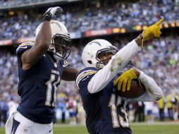 Keenan Allen (13) celebra la anotación que logró a pase de Philip Rivers. AP /