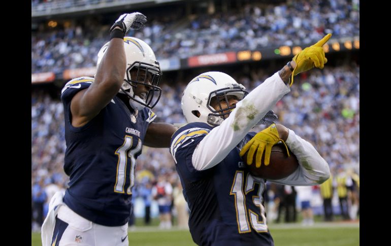 Keenan Allen (13) celebra la anotación que logró a pase de Philip Rivers. AP /