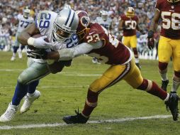 DeMarco Murray atrapa el ovoide y avanza hasta la zona de anotación para concretar la remontada de Dallas AP /