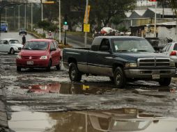 Aspecto de las afectaciones en una de las calles de la Zona Metropolitana de Guadalajara.  /