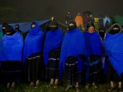 Mujeres enmascaradas zapatistas, durante el evento del 20 aniversario de la aparición pública del EZLN en Chiapas. AP /