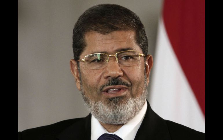 Morsi y otras 14 personas están acusadas de incitar a la matanza de manifestantes frente al palacio presidencial de El Cairo en 2012. ARCHIVO /