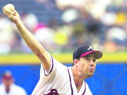 Greg Maddux, ex lanzador de Atlanta, obtuvo el primer puesto de la votación con 555 puntos. AP /