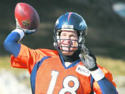 Manning durante el entrenamiento. Los Broncos descansaron la semana pasada porque fueron los sembrados número uno de la CA. AP /