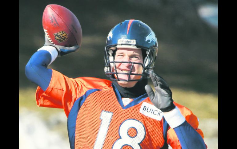 Manning durante el entrenamiento. Los Broncos descansaron la semana pasada porque fueron los sembrados número uno de la CA. AP /