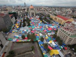 Cuando el plantón de la CNTE ocupaba la Plaza de la República, las pérdidas económicas diarias se calcularon en 500 mil pesos. ARCHIVO /