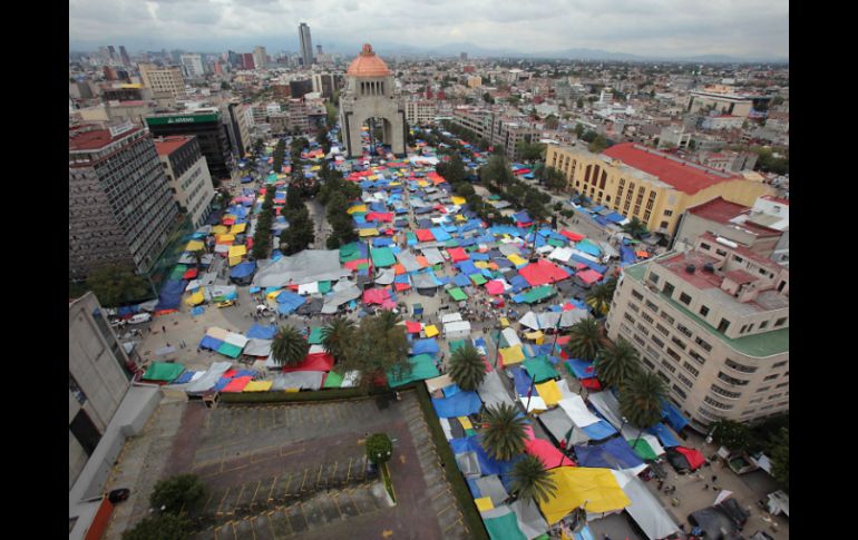 Cuando el plantón de la CNTE ocupaba la Plaza de la República, las pérdidas económicas diarias se calcularon en 500 mil pesos. ARCHIVO /