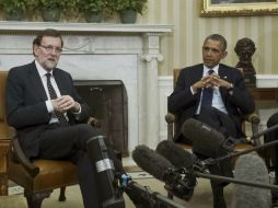 Rajoy se reúne con el presidente Obama en el despacho oval de la Casa Blanca. EFE /