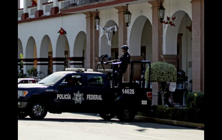 El municipio se encuentra resguardado desde la tarde de hoy por elementos del Ejército y de la Policía Federal. AFP /