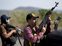 Líderes de autodefensas aseguran que no están pidiendo nada fuera de lo normal, 'queremos nuestra seguridad y la de nuestras familias'. AP /