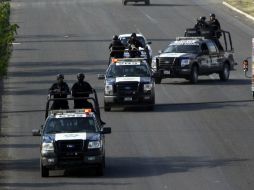 La Policía Federal ayer tomó control de la seguridad de Apatzingán y Uruapan. AFP /