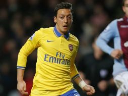 Varios jugadores del club Merengue resintieron la ausencia de Özil en la cancha. AP /