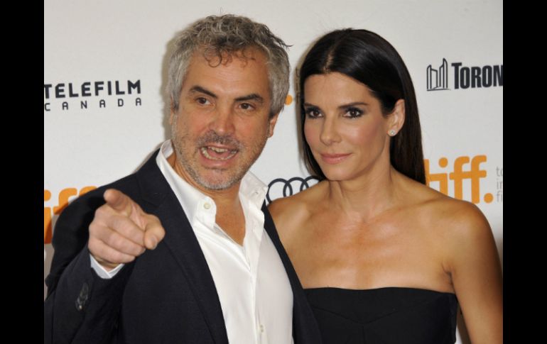 Cuarón y Sandra Bullock, nominados a Mejor Director y Mejor Actriz por ‘Gravedad’.  /