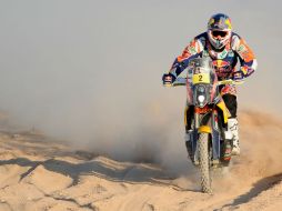 El español Marc Coma, del equipo KTM, se llevó el triunfo en las motos aunque fue sancionado por cambiar el motor. EFE /