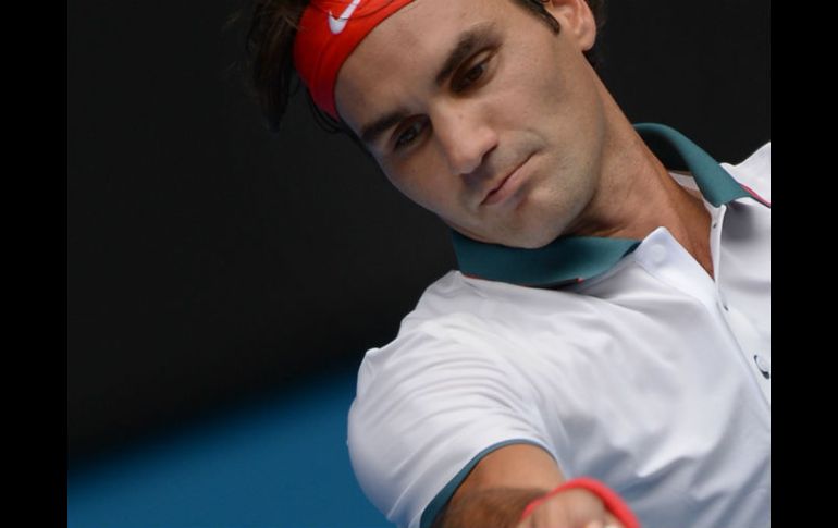 Federer sólo necesitó 1 hora y 41 minutos en el court principal Rod Laver Arena, de Melbourne, para clasificar. AFP /
