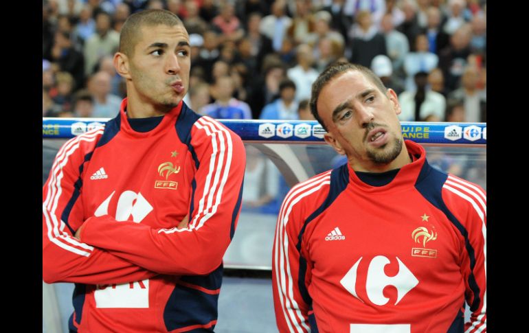 Franck Ribéry acepta haber pasado una noche con la involucrada, Karim Benzema lo niega. AFP /