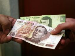 Al pagar con un billete de 500 pesos, la dueña del local se percató de que era falso. ARCHIVO /