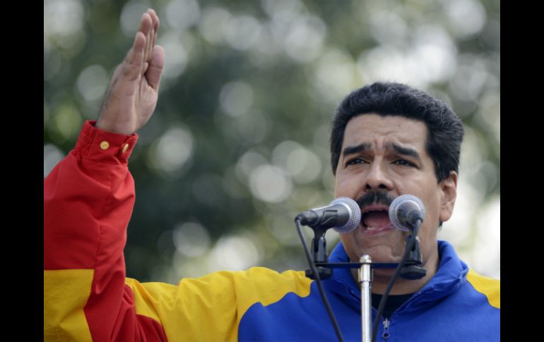Nicolás Maduro asegura que la norma es para la protección del pueblo y sus derechos económicos. AFP /