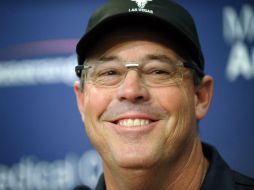 Greg Maddux, actualmente asistente de los Rangers de Texas, destacó como pitcher en Chicago y Atlanta. AP /