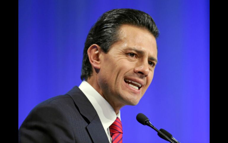 El Mandatario anunció en Davos las inversiones en México de capital extranjero por siete mil 350 millones de dólares. AP /