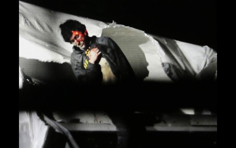 Fotografía de la policía de Massachusetts que muestra el momento de la captura de Dzhokhar Tsarnaev, el 19 de abril de 2013. AP /