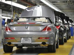 El clúster automotriz en Querétaro y Guanajuato está saturado, por lo que BMW debería establecerse en SLP, considera la CTM. AFP /