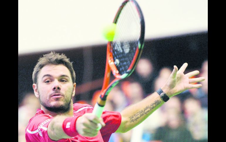 El suizo Stanislas Wawrinka se estrenó con triunfo en su primera serie como raqueta número uno de su país. AFP /