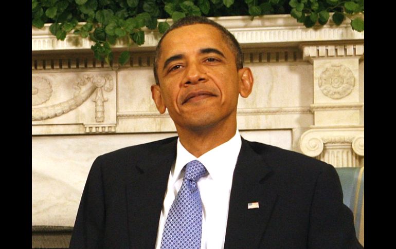 La aprobación al trabajo de Barack Obama sube cuatro puntos porcentuales en comparación a  noviembre y diciembre pasados. AP /