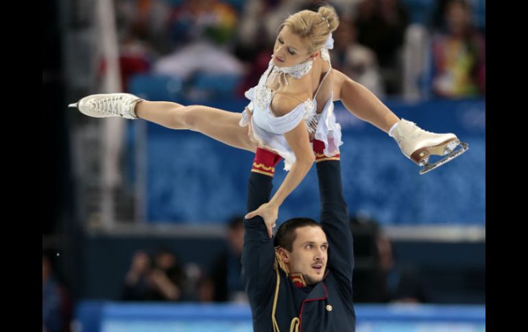 Momento de la rutina de la pareja rusa, compuesta por Tatiana Volosozhar y Maxim Trankov. AP /