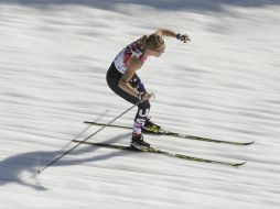 Sadie Bjornsen dijo que las condiciones climáticas estaban 'locas' y decidió salir luciendo sus brazos. AP /