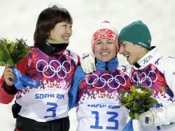 Las ganadoras: la china Xu Mengtao (izquierdo), la bielorrusa Alla Tsuper (centro) y la autraliana Lydia Lassila (derecha). AP /