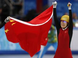 La patinadora china, Zhou Yang, celebra su triunfo en Sochi. AFP /