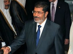 'Esto es todo una farsa, porque me tenéis miedo', declaró Morsi. ARCHIVO /