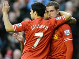 El Liverpool se aleja del Tottenham en la carrera por la cuarta plaza. EFE /