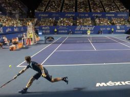 Andy Murray regresa una pelota al español Pablo Andújar, durante un partido del Abierto Mexicano de Tenis, en Acapulco. AFP /