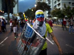 Las protestas en Venezuela han dejado 18 muertos, 261 heridos y más de mil detenciones, según cifras oficiales. ARCHIVO /